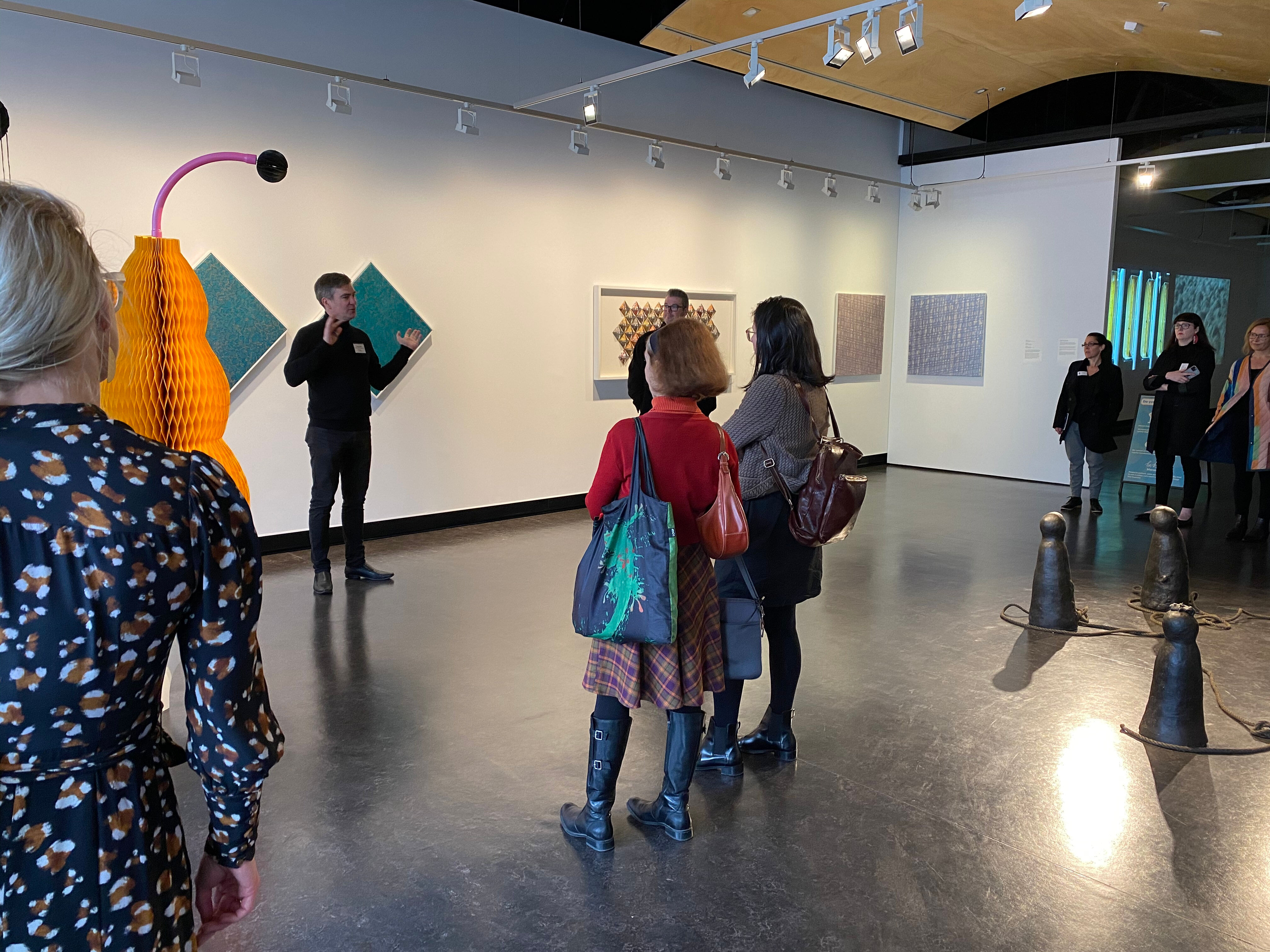 Victor Griss leads a tour if the Counihan Gallery