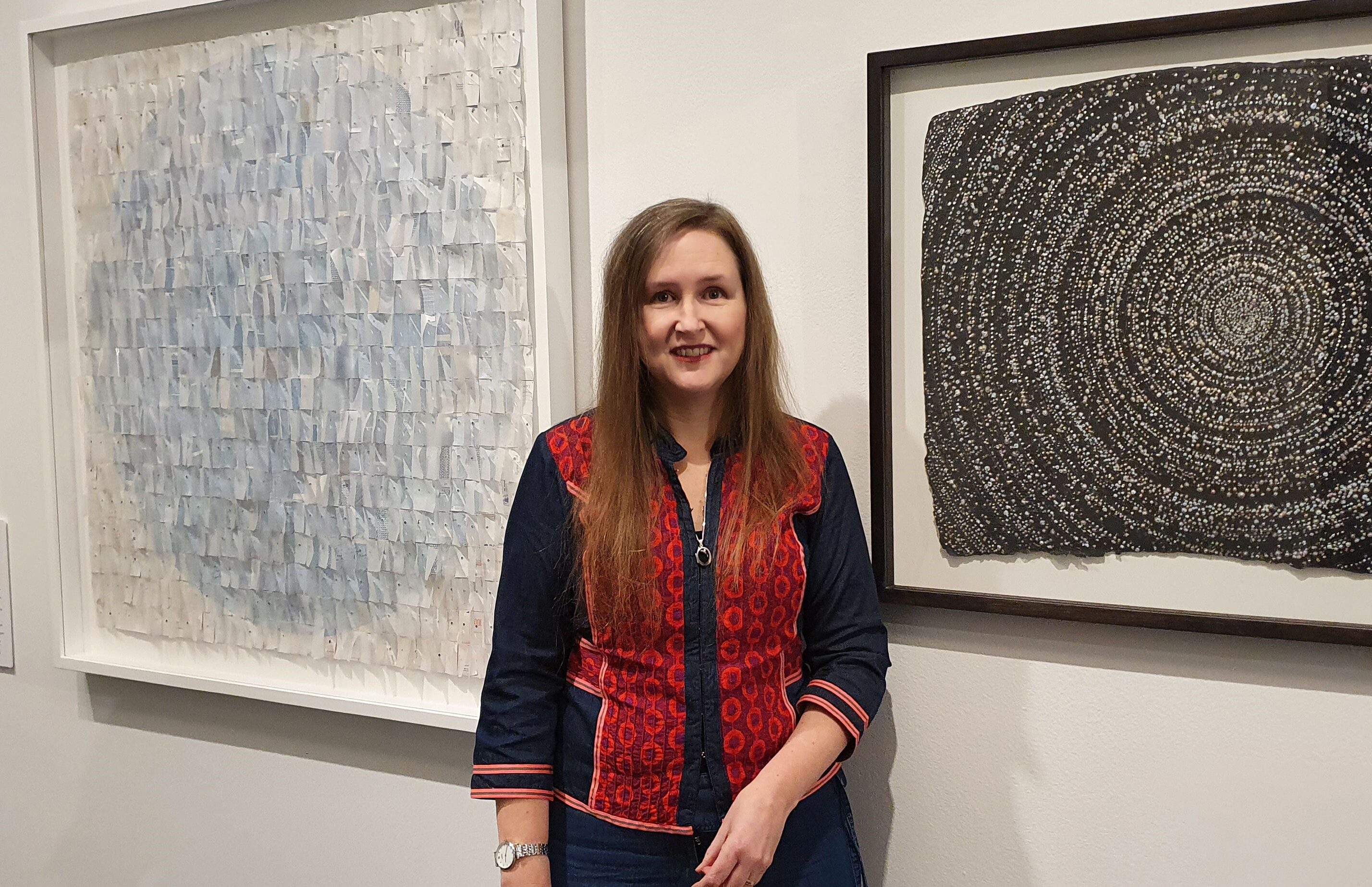 Ainsley with Louise Rippert’s works, Forget-me-not, 2020-21 and Black Bindu, 2014 crop 2