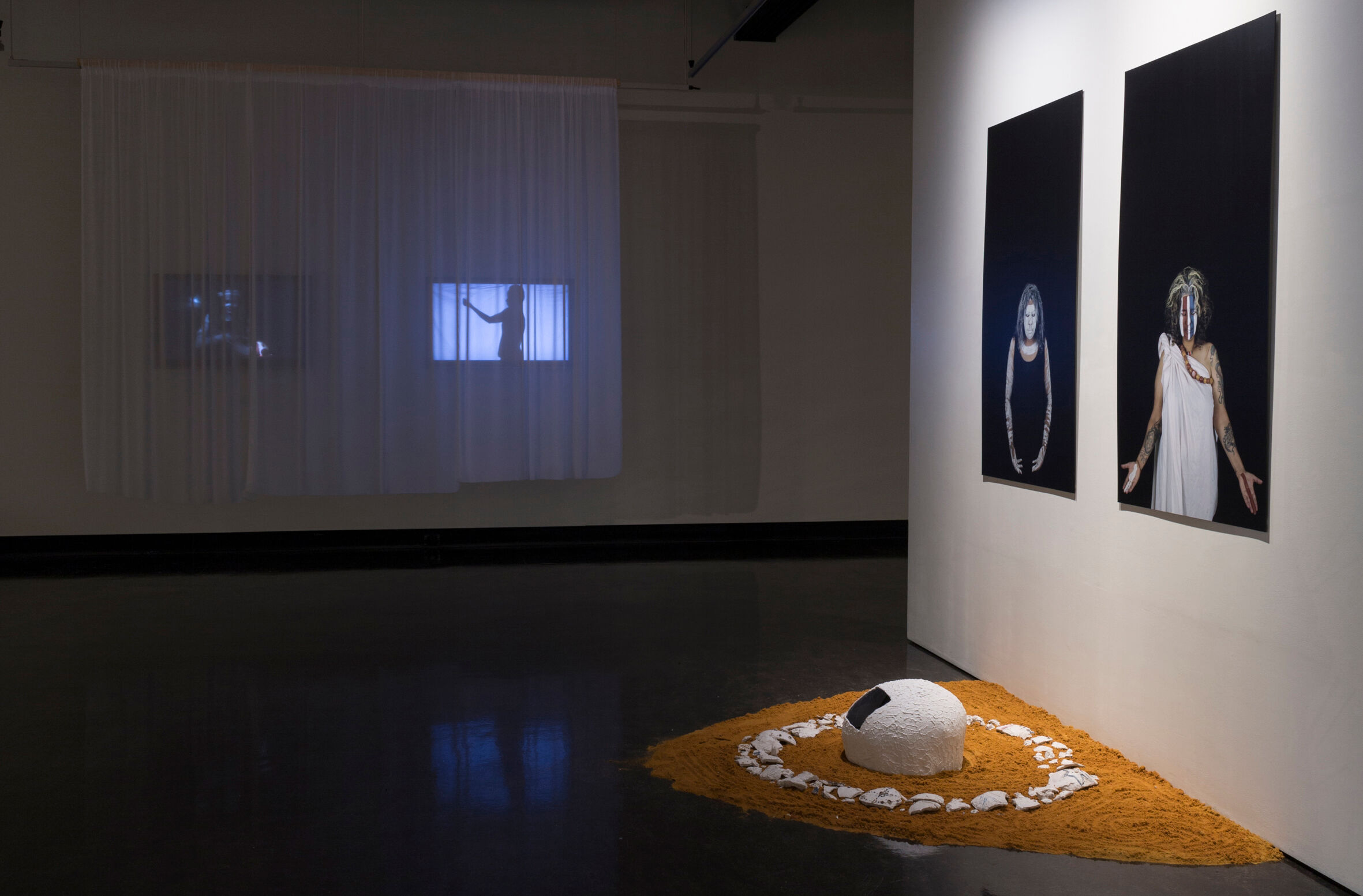 Both Side of the Street 2015 curated by Kimba Thompson & Eugenia Flynn. Install shot featuring Nadia Faragaab, Vicki Couzens and Maree Clark. Photograph: Janelle Low.